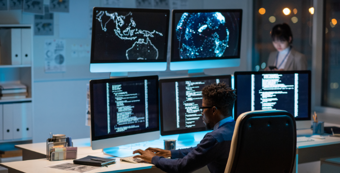 A software developer programming integrated analytics and reporting features to analyze data, gain relevant insights, and visualize key performance indicators related to supply chain operations.
